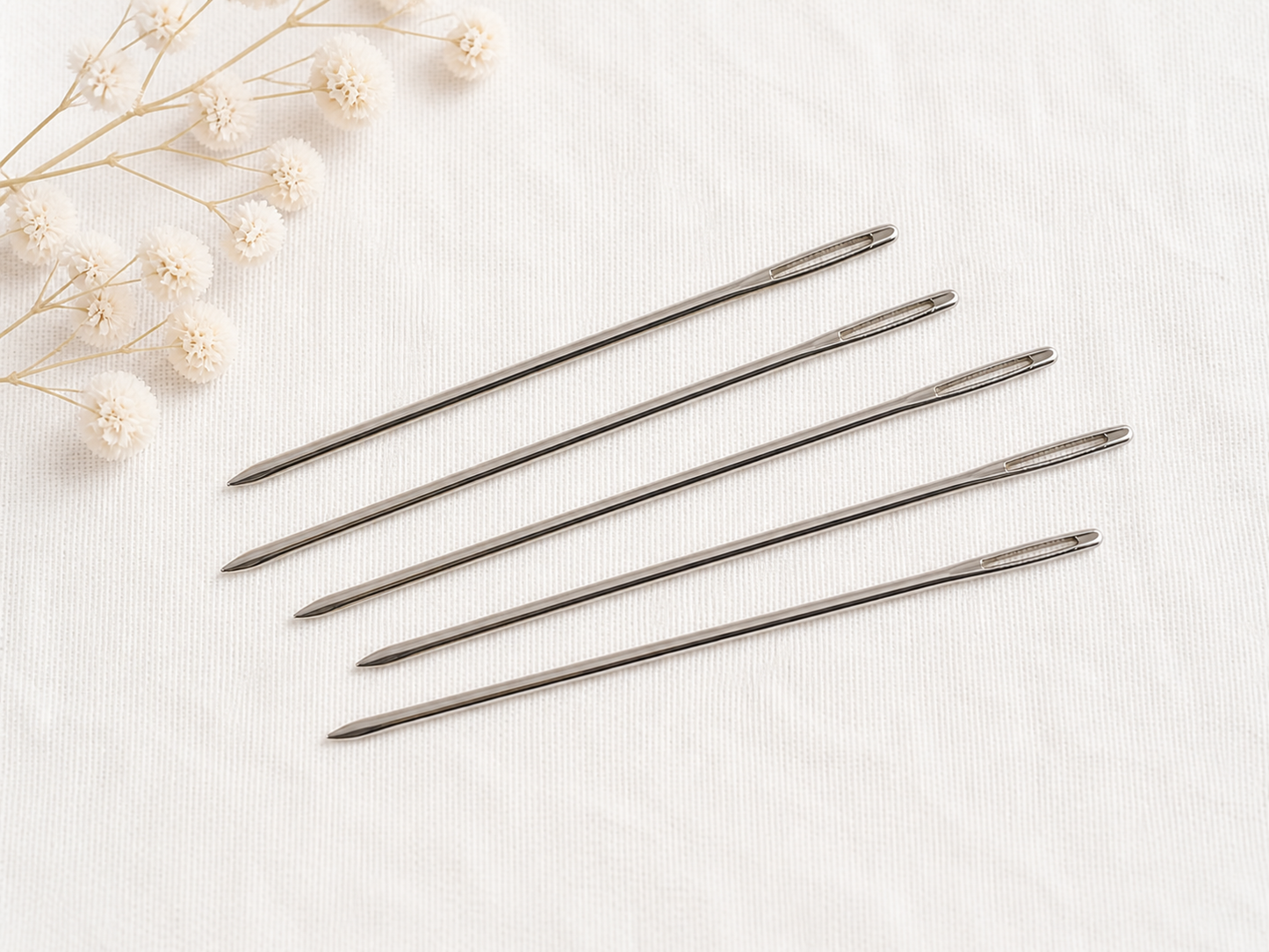 Aguja de metal con punta plana