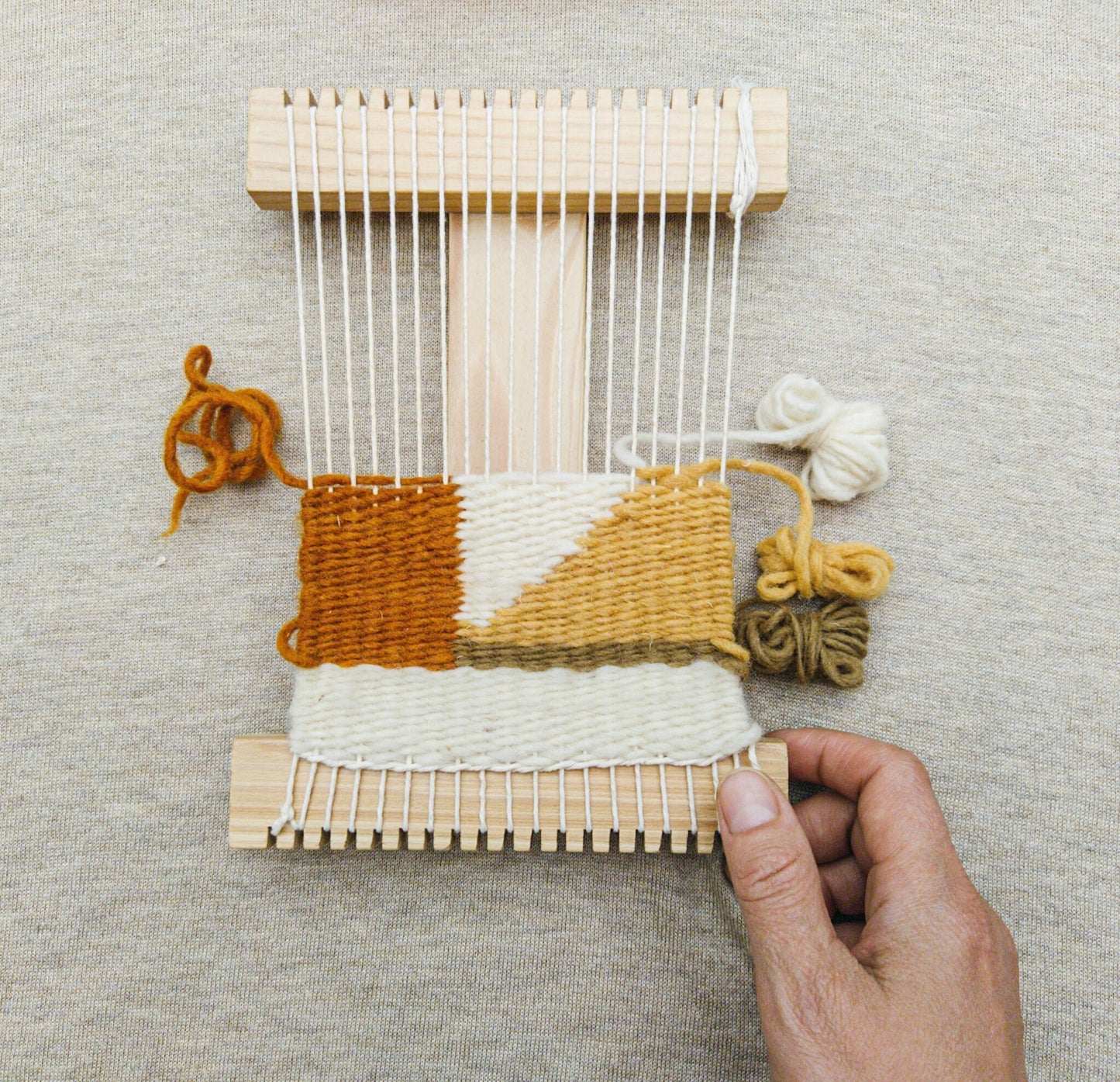 Little loom used in a weaving project